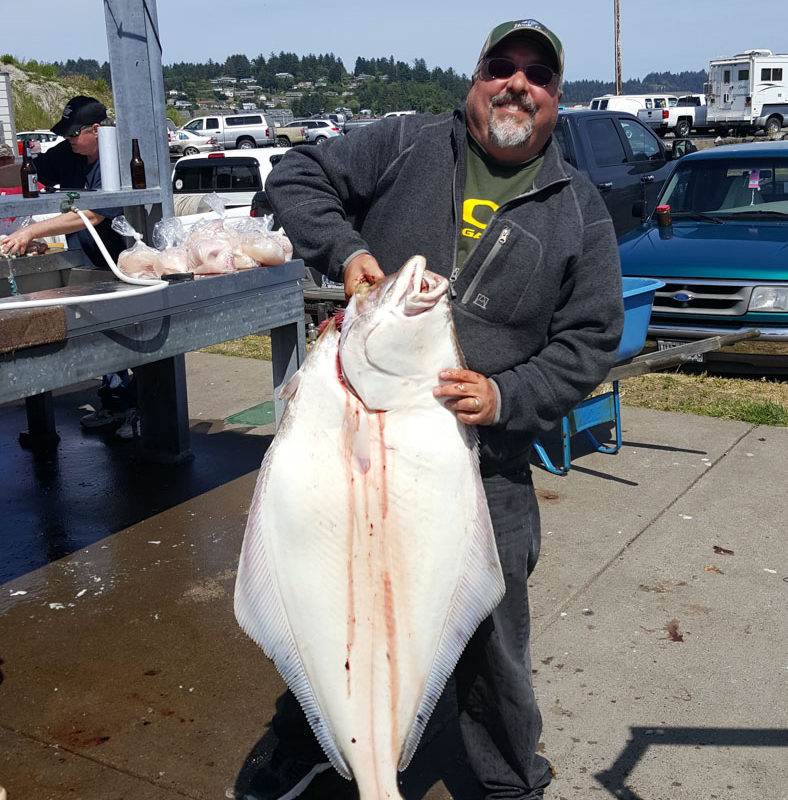 Man Holding Halibut